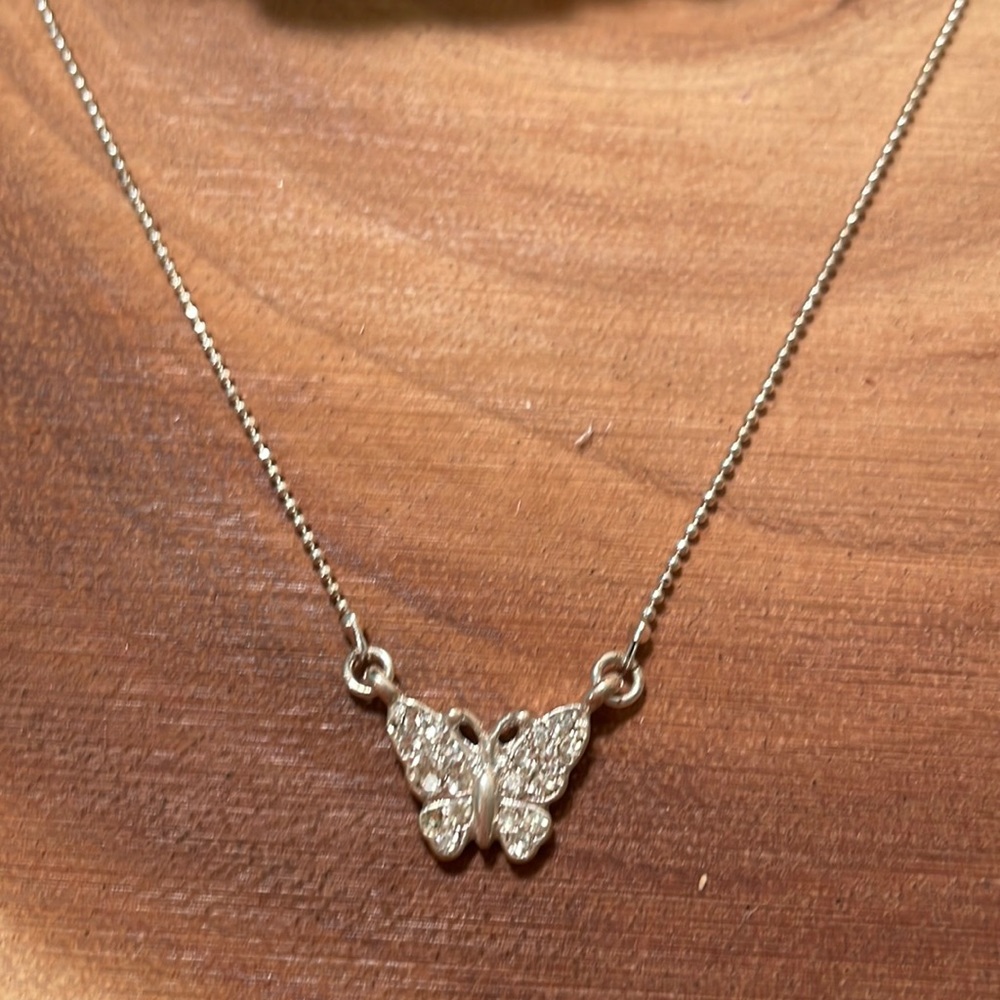 Adjustable dainty butterfly necklace.
